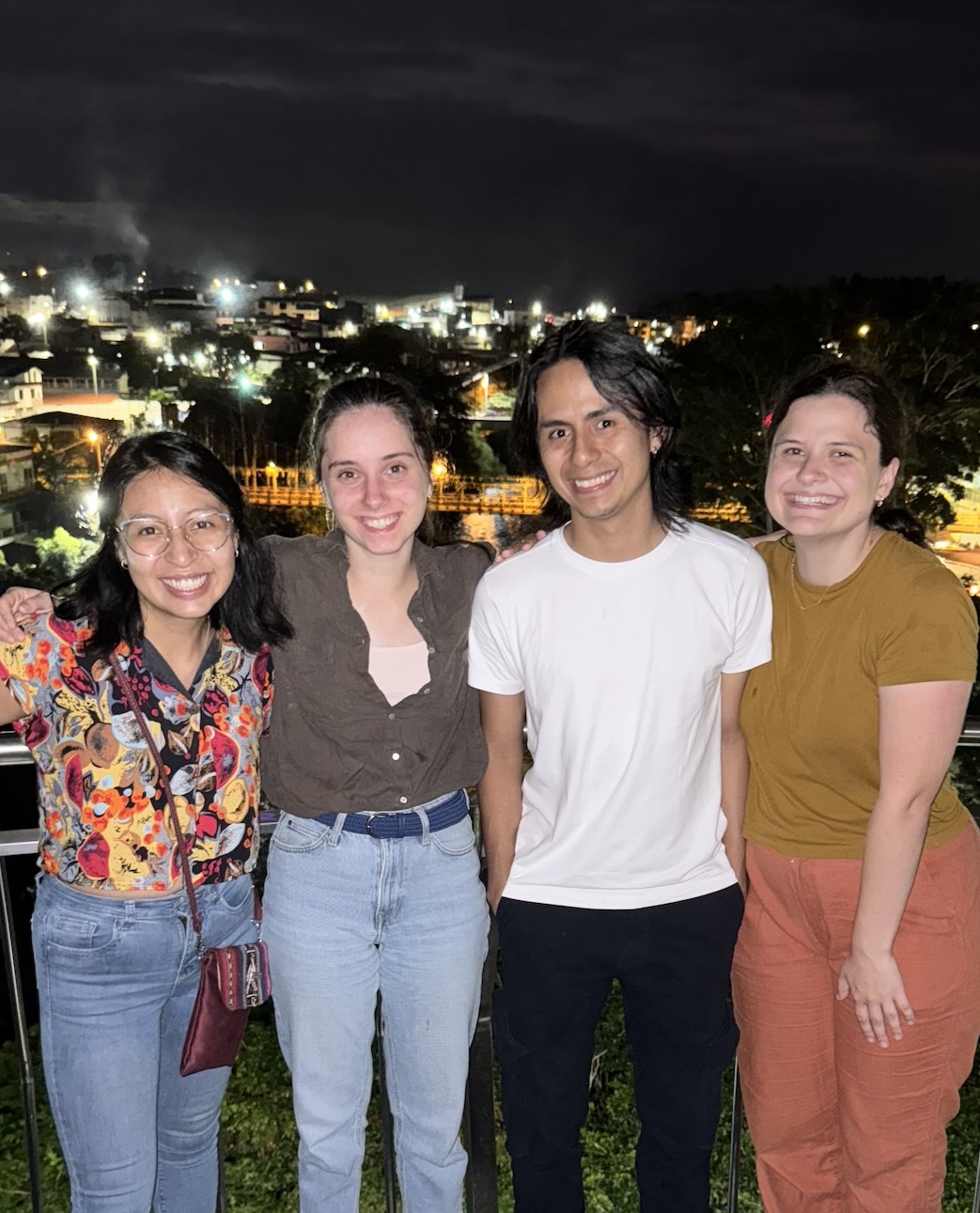 Laura poses with her research team, for both the CRISPR and mate choice projects, in Tena, Ecuador.